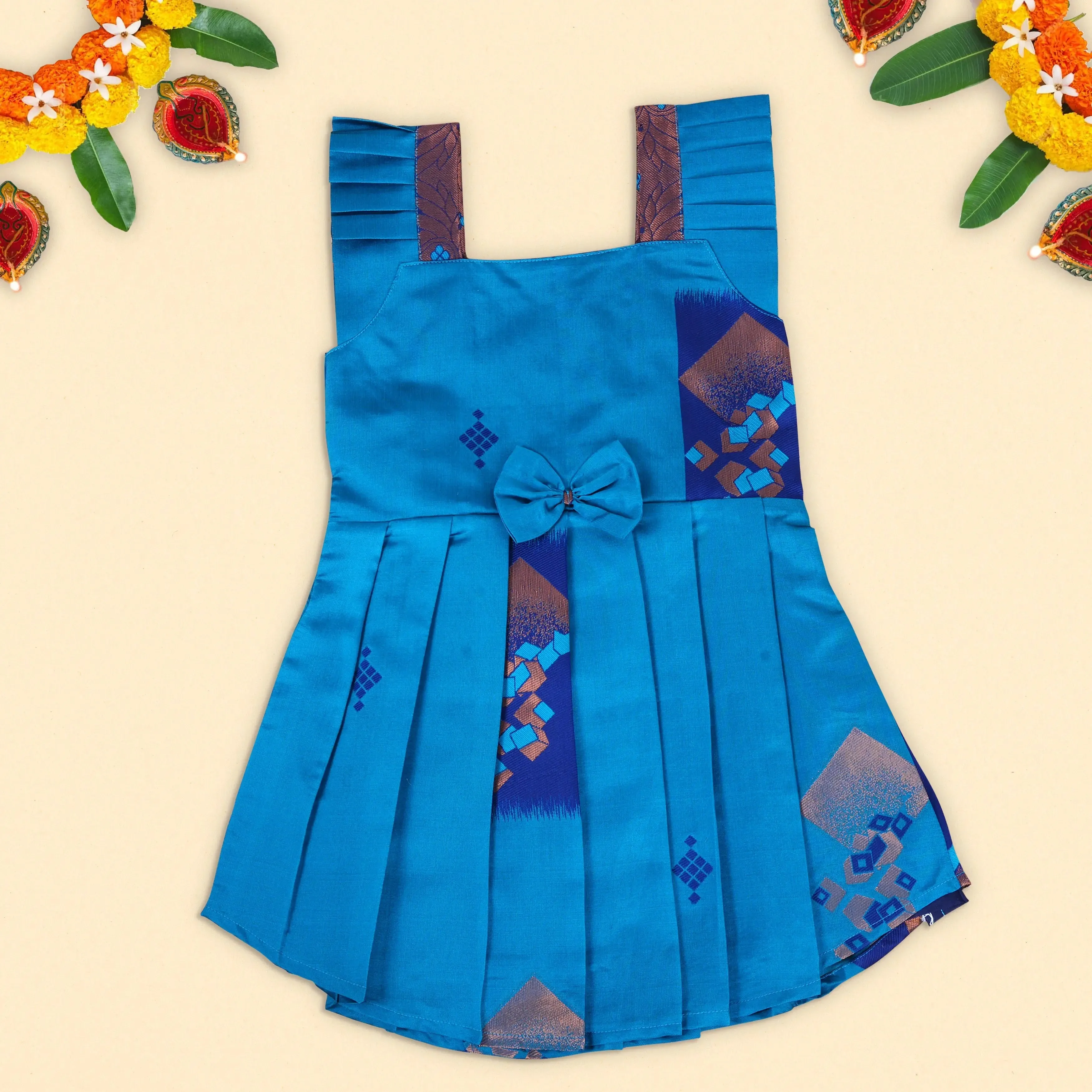 Vibrant Blue Ethnic Frock with Pleated Straps and Elegant Bow